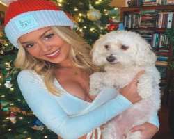 Morgan is accompanied by a cute dog named Charlie in her home.